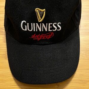 Guinness Black Cap with Gold and Red Accents